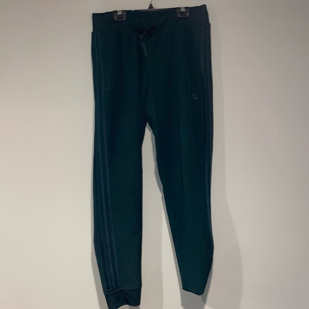 Dark green adidas track pants size Medium